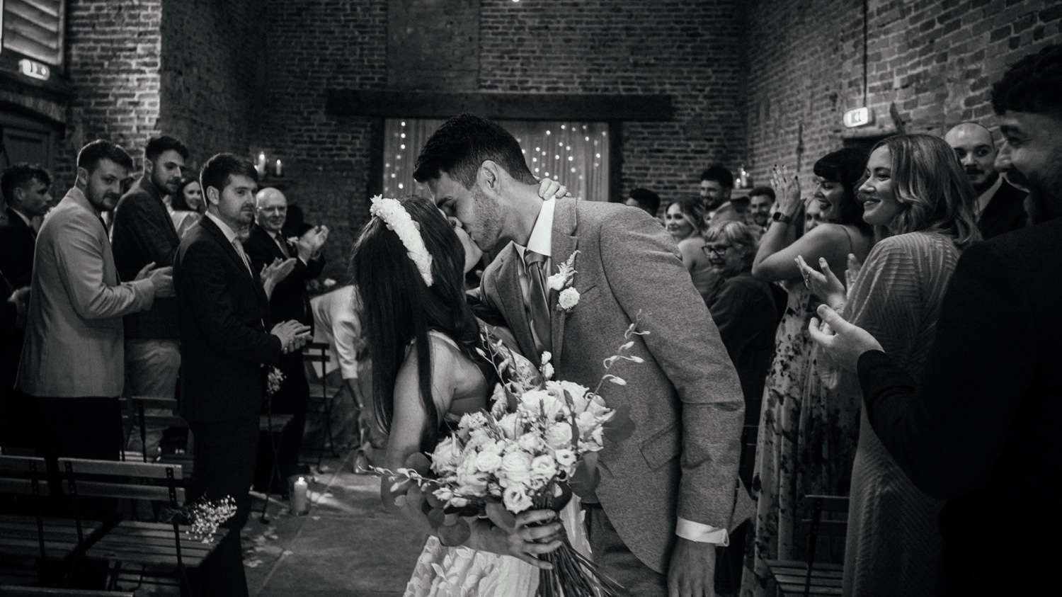 Kiss at the bottom of the aisle - Wedding ceremony at the barns east yorkshire