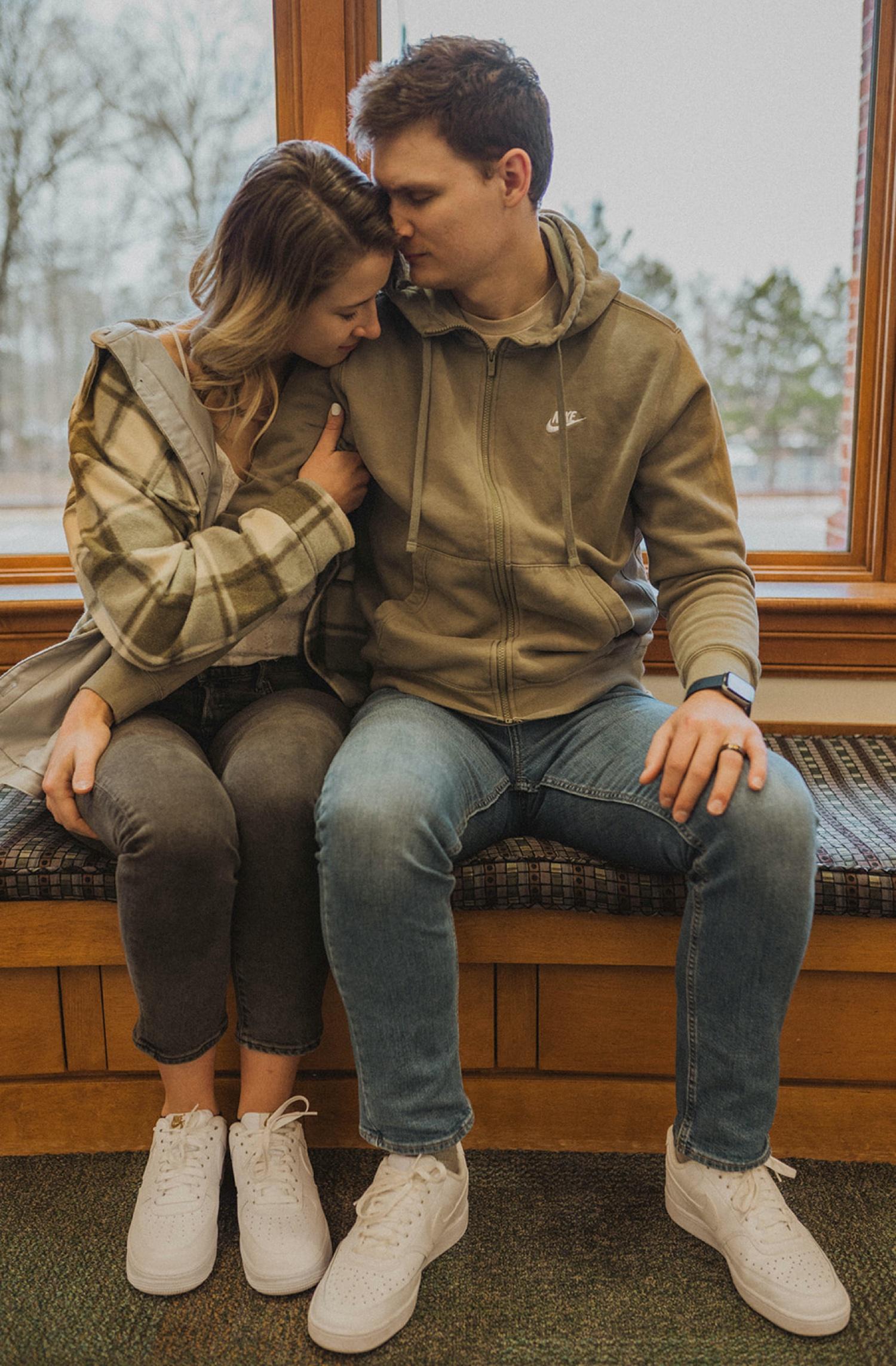 Couple Sitting on Bench Kissing · Free Stock Photo