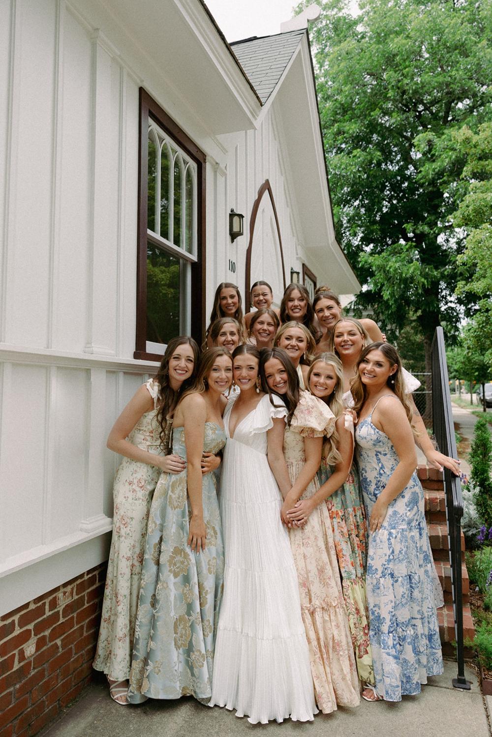 bridal party with different dresses 4 Ways to Dress Bridesmaids in Rainbow Shades