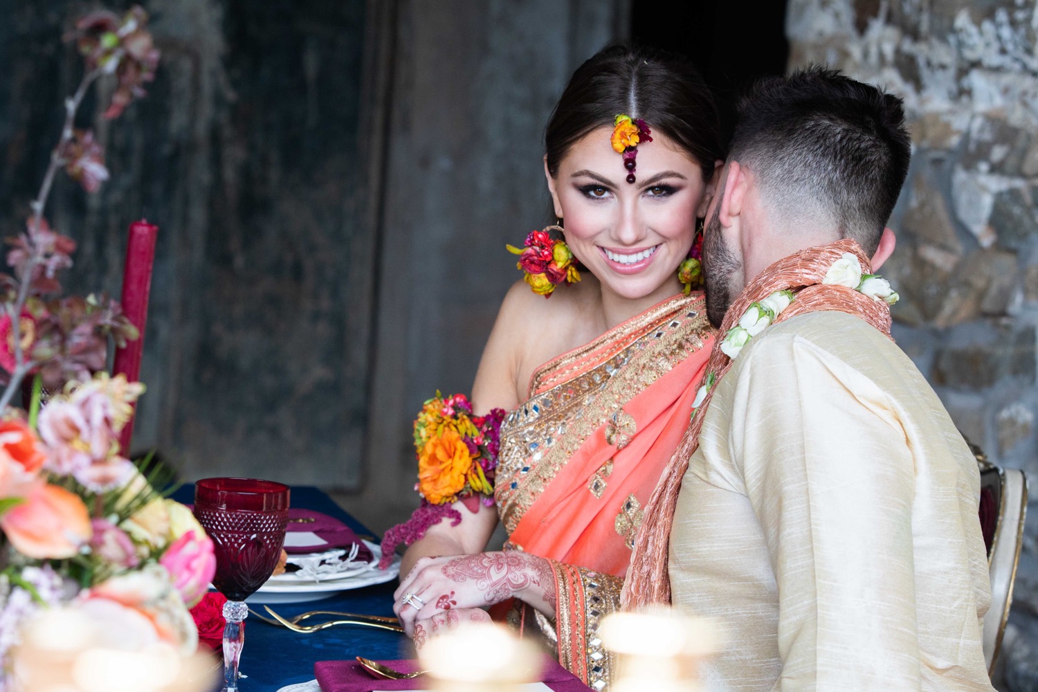 women hand being decorated with henna Tattoo. mehendi on hand, Its a wedding  dress and makeup of Indian bride for Haldi function Stock Photo - Alamy